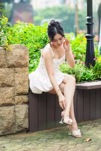 VGU No.3 - Elegant Girl in White Dress Gracing a Lush Green Garden-2