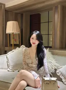 Captivating Beauty: Young Woman in Elegant Lace Dress Shines in Luxurious Restaurant Setting.-14