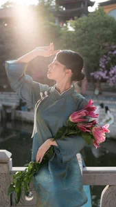 Classic Elegance: Vietnamese Tradition in Blue Silk and Pink Lilies-8