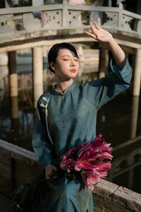 Classic Elegance: Vietnamese Tradition in Blue Silk and Pink Lilies-12