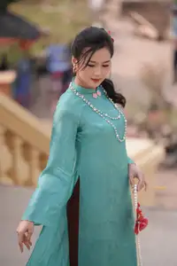 Captivating Charm: Vietnamese Girl's Elegance in a Stunning Mint Green Ao Dai-15