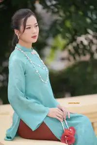 Captivating Charm: Vietnamese Girl's Elegance in a Stunning Mint Green Ao Dai-0