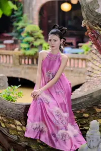 Timeless Grace: Vietnamese Woman's Modern Elegance Amidst Ancient Architecture.-4
