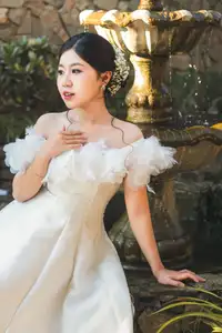 Elegant Bride Plays White Piano Amidst Lush Greenery: A Serene Wedding Moment-5