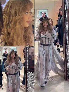 Lisa of Blackpink stuns with bold hippie curls at an international fashion event-5