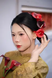 Graceful Vietnamese Ao Dai: Traditional Beauty Adorned with Red Calla Lilies-4