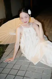 Ethereal Beauty: Woman in White Dress with Elegant Paper Umbrella at Night-5