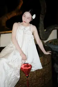 Ethereal Beauty: Woman in White Dress with Elegant Paper Umbrella at Night-2