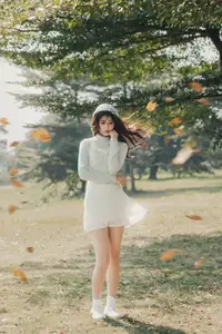 Ethereal Beauty: Young Woman in White Lace Dress Amidst Daisy Field Under Summer Sun-13