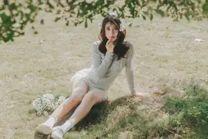 Ethereal Beauty: Young Woman in White Lace Dress Amidst Daisy Field Under Summer Sun-5