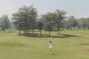 Ethereal Beauty: Young Woman in White Lace Dress Amidst Daisy Field Under Summer Sun-4