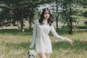 Ethereal Beauty: Young Woman in White Lace Dress Amidst Daisy Field Under Summer Sun-12