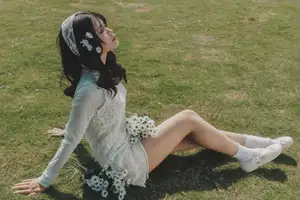 Ethereal Beauty: Young Woman in White Lace Dress Amidst Daisy Field Under Summer Sun-9