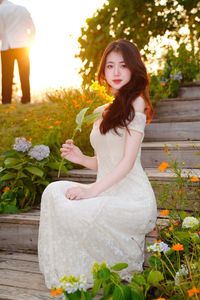 XVG No.2: Serene Beauty A Vietnamese Girl Amidst a Vibrant Flower Garden-3