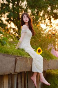 XVG No.2: Serene Beauty A Vietnamese Girl Amidst a Vibrant Flower Garden-5