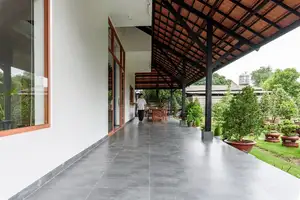 Explore Modern Tiled Roof House: Traditional charm meets green living, ideal architecture for a peaceful retirement.-0