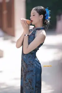 Captivating Asian Beauty: Elegant Woman in Blue Cheongsam with Traditional Fan-11