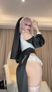 Coser Jiu Yan's Alluring Nun 2 Cosplay: Enchanting Anime Beauty with Striking Pink Hair and Mysterious Gaze. Explore Now!-8