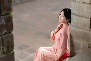 Graceful Asian Young Woman in Traditional Pink Attire: Timeless Beauty by an Ancient Wall-5