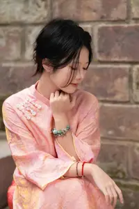 Graceful Asian Young Woman in Traditional Pink Attire: Timeless Beauty by an Ancient Wall-12