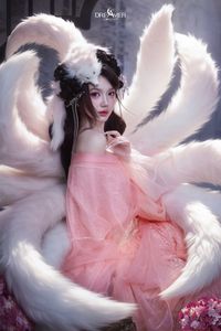 Mesmerizing Nine-Tailed Fox Cosplay: Ethereal Beauty in a Cherry Blossom Garden-3