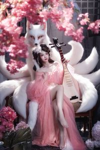 Mesmerizing Nine-Tailed Fox Cosplay: Ethereal Beauty in a Cherry Blossom Garden-7