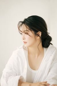 Captivating Female Portrait Bathed in Radiant Morning Sunlight, Embracing Natural Beauty 1000018680-6