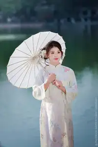 Enchanting East Asian Beauty: A Serene Muse in White Cheongsam under Soft Sunlight by the Lake.-3