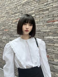 Adorable Girl with Blunt Bangs & Short Hair - Youthful & Charming Style Photo-4