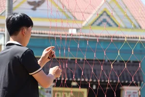 Vibrant Tet Traditions: Discover the Colorful Lunar New Year Bamboo Poles (Cay Neu) Along the Scenic Roads of Gia Lai, Vietnam-2
