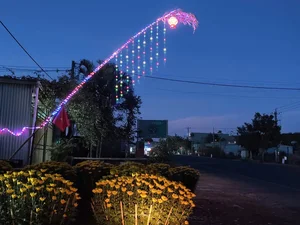 Vibrant Tet Traditions: Discover the Colorful Lunar New Year Bamboo Poles (Cay Neu) Along the Scenic Roads of Gia Lai, Vietnam-7