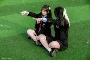 Graceful Vietnamese Girl in Elegant White Ao Dai with Sweet Finger Heart Gesture-9