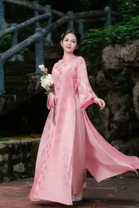 Pink Ao Dai Charm: Discover the Ethereal Beauty of Vietnamese Women in Ancient Heritage Settings.-9