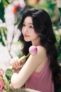 Vietnamese Grace: Elegant Girl in Traditional Flower Market, Discover Vibrant Culture 1000019476-15