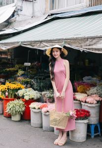 Vietnamese Grace: Elegant Girl in Traditional Flower Market, Discover Vibrant Culture 1000019476-13