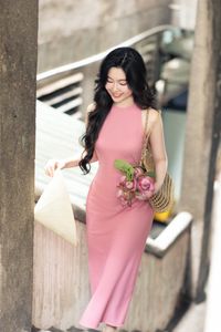 Vietnamese Grace: Elegant Girl in Traditional Flower Market, Discover Vibrant Culture 1000019476-11