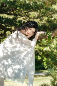 Ethereal Beauty in a White Flower Field: A Muse Under the Sun-12