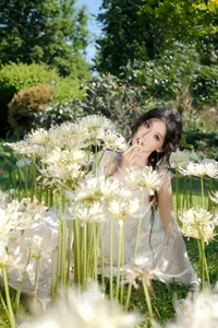 Ethereal Beauty in a White Flower Field: A Muse Under the Sun-5