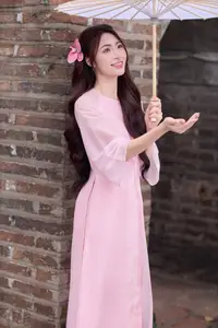 Gentle Pink Ao Dai: Vietnamese Beauty Shines by Hoan Kiem Lake in Spring Hanoi-10