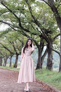 Nature and Girl: Elegant Beauty Amidst a Vibrant Flower Garden-2