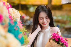 Radiant Vietnamese Girl Amidst a Sea of Vibrant Flowers-0