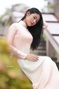 Graceful Vietnamese Lady in Traditional Ao Dai  1000024954-1