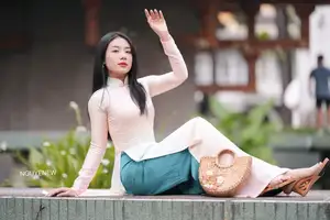 Graceful Vietnamese Lady in Traditional Ao Dai  1000024954-27