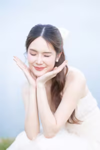 XVG No.19: Radiant Bride: Beautiful Woman in Elegant White Gown with a Joyful Smile in Lush Green Setting.-2