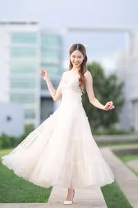 XVG No.19: Radiant Bride: Beautiful Woman in Elegant White Gown with a Joyful Smile in Lush Green Setting.-14