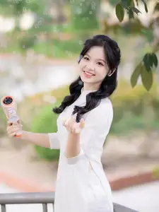 Discover the Timeless Charm of a Vietnamese Girl in Elegant White Ao Dai-6