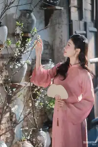 Serene Beauty of a Lady in Pink Traditional Dress with Spring Blossoms-14