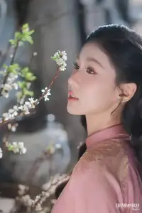 Serene Beauty of a Lady in Pink Traditional Dress with Spring Blossoms-0