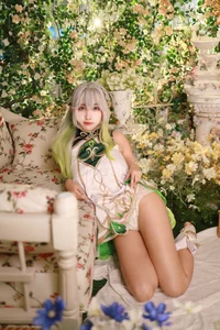 Ethereal Wisdom: Mumu Momo Captures the Divine Essence of Nahida in Stunning Cosplay-8