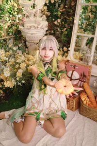 Ethereal Wisdom: Mumu Momo Captures the Divine Essence of Nahida in Stunning Cosplay-0